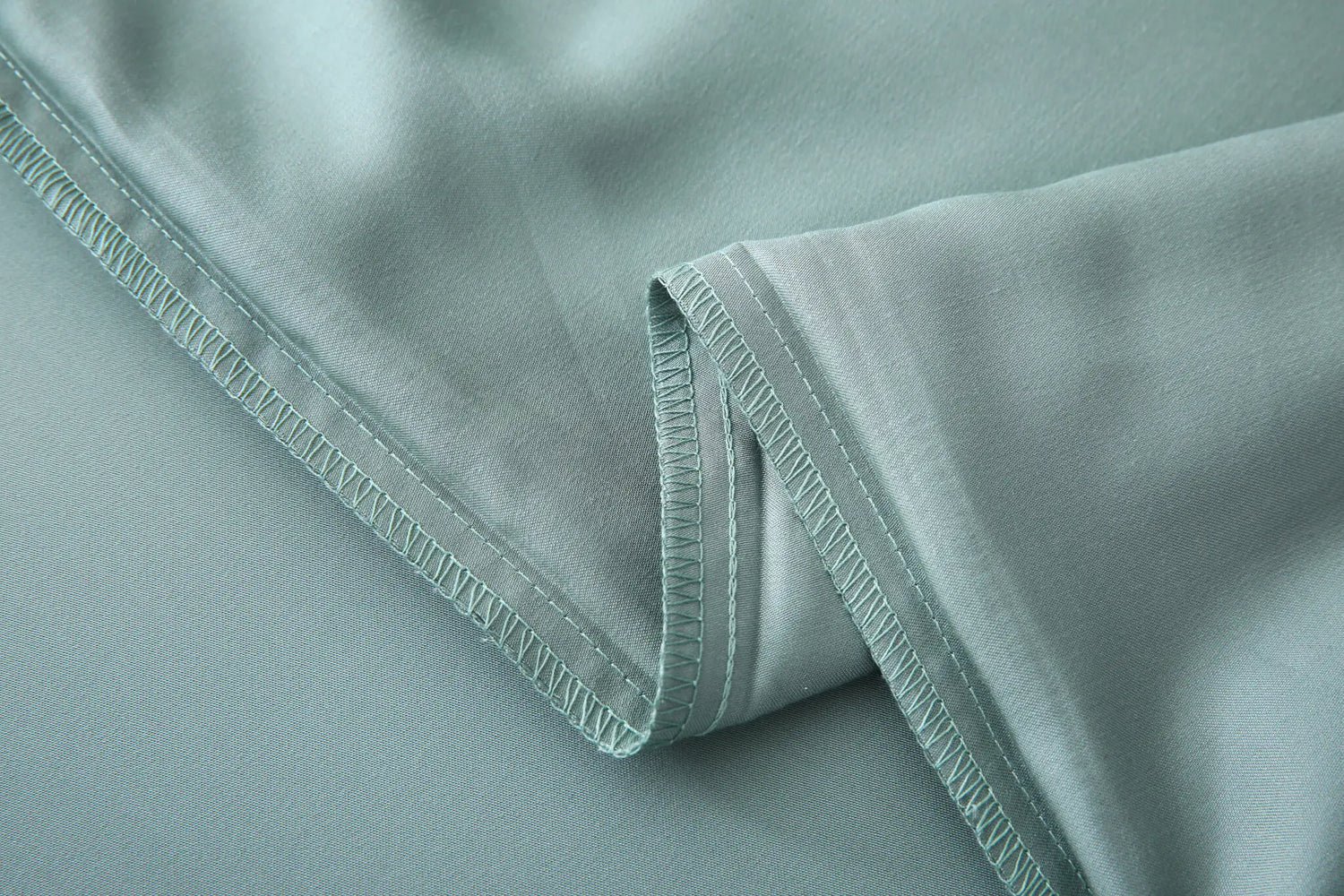 מצעי במבוק סאטן בצבע אוקיינוס ירוק