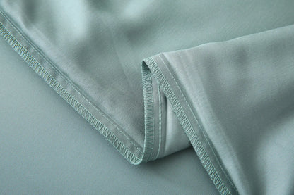 מצעים מבד במבוק בצבע ירוק עם תפירה כפולה